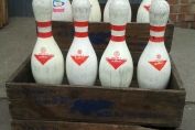 Bowling Pins in Cranberry Crates