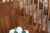 Staircase in oak, carved scroll detail