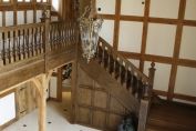 Oak Staircase with panelled understair cupboard